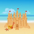 Sandcastle on tropical beach. Summer background. Royalty Free Stock Photo