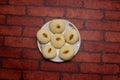 Sandesh or Shondesh sweet served in plate isolated on background top view of bangladeshi dessert food