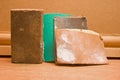 Sanding block and used sandpaper. Royalty Free Stock Photo