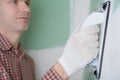 Sanding the drywall mud Royalty Free Stock Photo