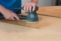 Sanding And Refinishing A Tabletop Royalty Free Stock Photo