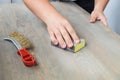 Sanding the wood table top Royalty Free Stock Photo