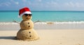 Sandman wearing sunglasses on tropical beach celebrating Christmas vacation Royalty Free Stock Photo