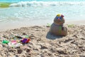 The Sandman in the tropics. snowman on the beach. Christmas on the beach Royalty Free Stock Photo