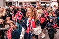 Group Of Men Women And Children Carrying Norwegian Flags Independence Day Parade