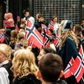 Men Women And Children Carrying Norwegin Flags During Norwegian Independence Day