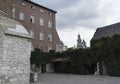 Sandomierska tower of wawel castle gardens in cloudy sunny day Royalty Free Stock Photo