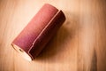 Sandpaper roll on a wooden table Royalty Free Stock Photo