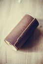 Sandpaper roll on a wooden table Royalty Free Stock Photo