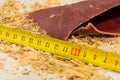 Sandpaper, ruler and sawdust Royalty Free Stock Photo