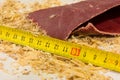 Sandpaper, ruler and sawdust Royalty Free Stock Photo