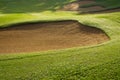sandpit bunker golf course backgrounds, The sandpit on the golf course fairway is used as a hurdle for athletes to compete Royalty Free Stock Photo