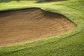 sandpit bunker golf course backgrounds, The sandpit on the golf course fairway is used as a hurdle for athletes to compete Royalty Free Stock Photo