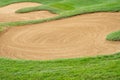 sandpit bunker golf course backgrounds, The sandpit on the golf course fairway is used as a hurdle for athletes to compete Royalty Free Stock Photo