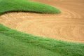 sandpit bunker golf course backgrounds, The sandpit on the golf course fairway is used as a hurdle for athletes to compete Royalty Free Stock Photo