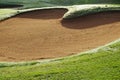 sandpit bunker golf course backgrounds, The sandpit on the golf course fairway is used as a hurdle for athletes to compete Royalty Free Stock Photo