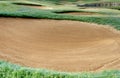 sandpit bunker golf course backgrounds, The sandpit on the golf course fairway is used as a hurdle for athletes to compete Royalty Free Stock Photo