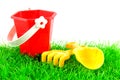 Sandpit toys on green grass