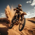 Sands of thrill Motocross rider in desert, executing breathtaking jumps Royalty Free Stock Photo