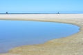 Sandspit on remote Pacific beach Royalty Free Stock Photo