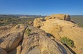 Sandstone Bluff Rising Out of a Lava Plain Royalty Free Stock Photo