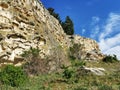 Sandstone cliff at Maori rock art site in New Zealand Royalty Free Stock Photo