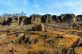Sandstone cliffs and forest landscape under clear blue sky Royalty Free Stock Photo