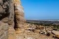 Sandstone cliffs at Pett Level beach, with a blue sky behind