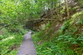 Sandstone cliffs and walkway in Hinni canyon (Hinni kanjon) Estonia