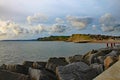 The sandstone cliffs at West Bay in Dorset, England. This is part of the Jurassic coast which runs from Exmouth in Devon to Royalty Free Stock Photo