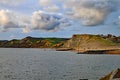 The sandstone cliffs at West Bay in Dorset, England. This is part of the Jurassic coast which runs from Exmouth in Devon to Royalty Free Stock Photo