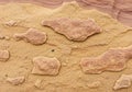 Sandstone formations with layered textures in a desert Royalty Free Stock Photo