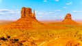 The sandstone formations of West Mitten Butte and East Mitten Butte in the desert landscape of Monument Valley Royalty Free Stock Photo