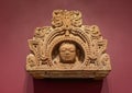 Sandstone late 5th century architectural fragment with a head on display in the Dallas Museum of Art.