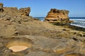 Sandstone rock on beach Royalty Free Stock Photo