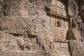 Sandstone rock with carved tombs of persian kings in Necropolis, Iran. King burial site of ancient Persia. Zoroastrian