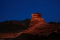 Sandstone rock is illuminated by a flashlight in Herman Cav Canyon at night. South Gobi, Mongolia. Herman Tsav, Martian landscape