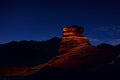 Sandstone rock is illuminated by a flashlight in Herman Cav Canyon at night. South Gobi, Mongolia. Herman Tsav, Martian landscape