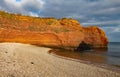 A sandstone sea stack at Ladram Bay near Sidmouth, Devon in the evening sun. Part of the south west coastal path