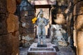 Sandstone statue of god Khmer Art at ancient thai castle or Prasat Muang Singh in Kanjanaburi , Thailand Royalty Free Stock Photo