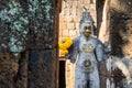 Sandstone statue of god Khmer Art at ancient thai castle or Prasat Muang Singh in Kanjanaburi , Thailand Royalty Free Stock Photo