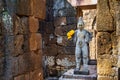 Sandstone statue of god Khmer Art at ancient thai castle or Prasat Muang Singh in Kanjanaburi , Thailand Royalty Free Stock Photo