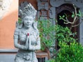 sandstone statue of woman, hindu religion statues in Bali, Indonesia. Royalty Free Stock Photo