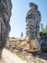 Sandstone tower at entrance to rocky labirynth Ostas Table Mountain