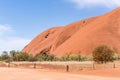 Sandstone Uluru rock on the background of the blue sky