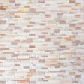 Sandstone wall background of white golden sand stone jigsaw tile, rock brick modern texture pattern for backdrop decoration Royalty Free Stock Photo