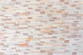 Sandstone wall background of white golden sand stone jigsaw tile, rock brick modern texture pattern for backdrop decoration Royalty Free Stock Photo