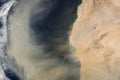 Sandstorm washed off into the ocean, view from space.Elements of this image were furnished by NASA