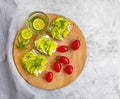 Sandwich with avocado lime freshness concrete background