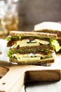 Sandwich with bacon, cheese and eggs Royalty Free Stock Photo